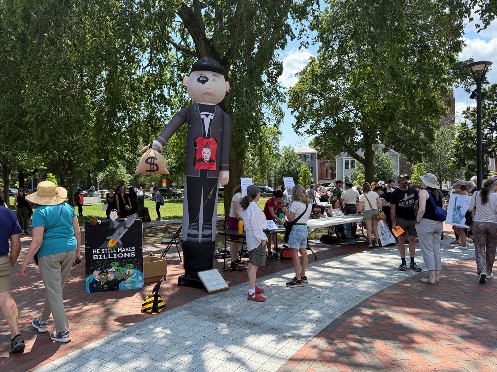 Elon Musk balloon at protest