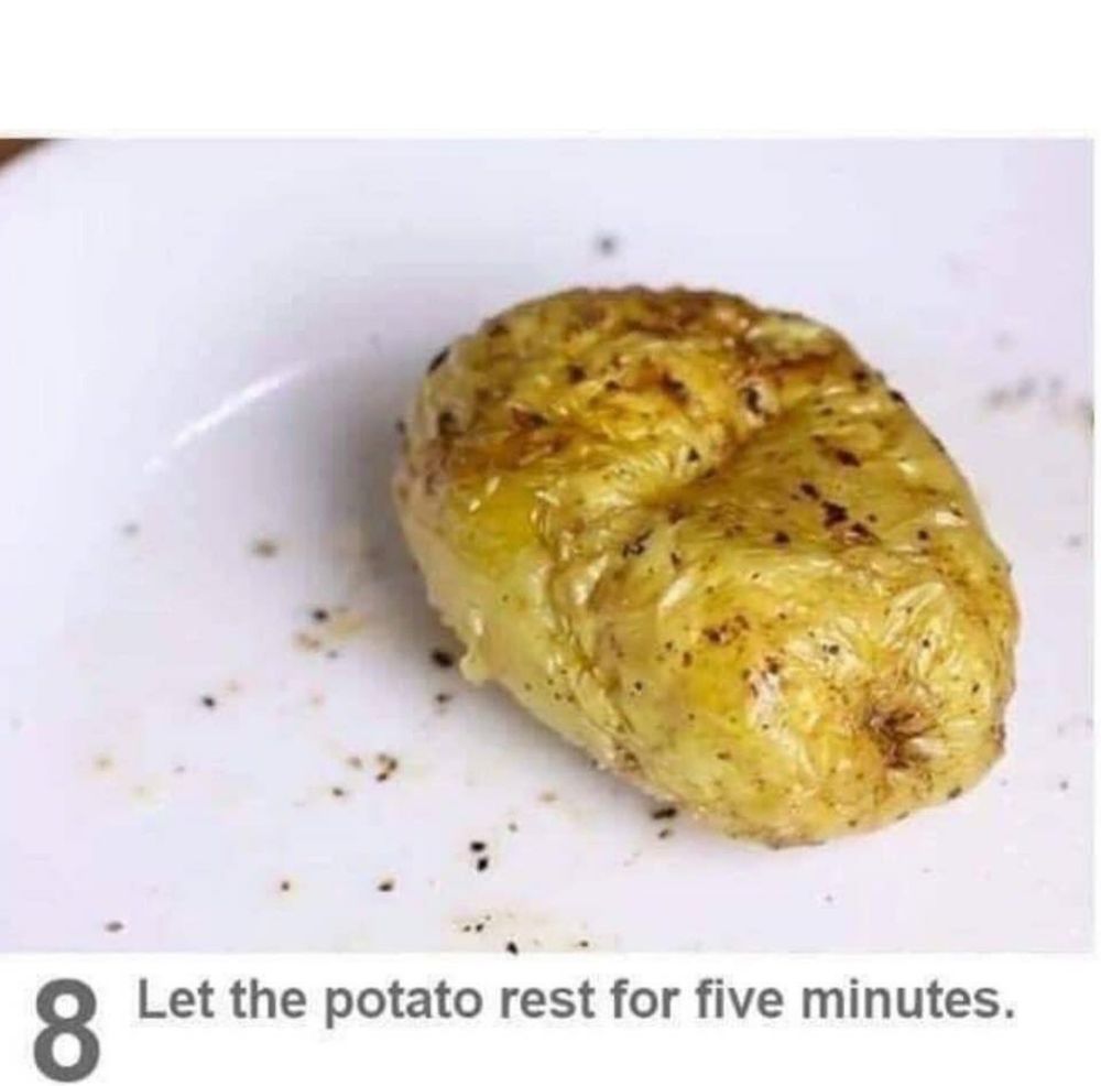 A microwave-baked potato is pictured on a white plate. Underneath an instruction reads: "Let the potato rest for five minutes"