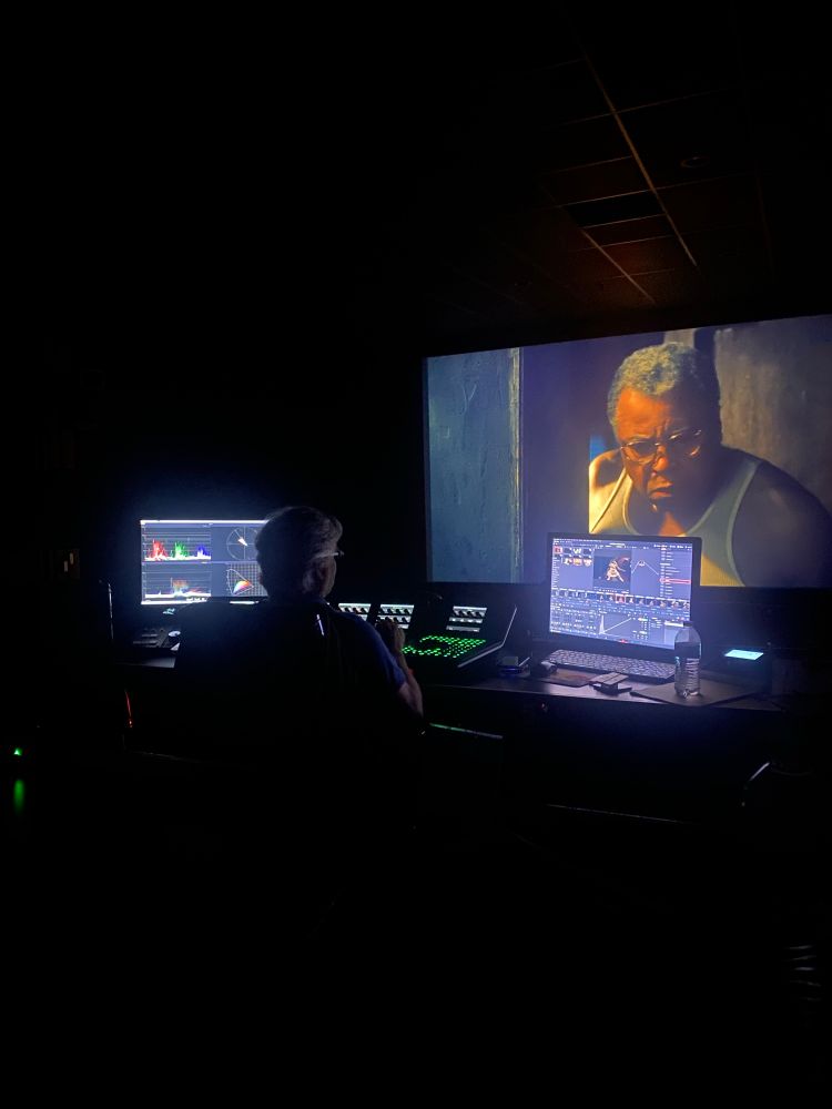 a film preservationist works on charles burnett’s “annihilation of fish” (1999) with charles burnett overseeing the process.