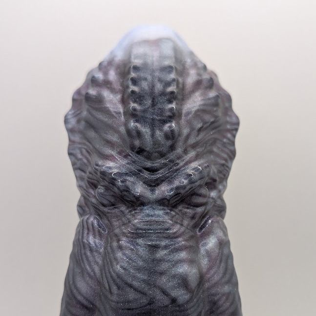 photo in a lightbox of the Cthulhu dildo from Uberrime showing the face