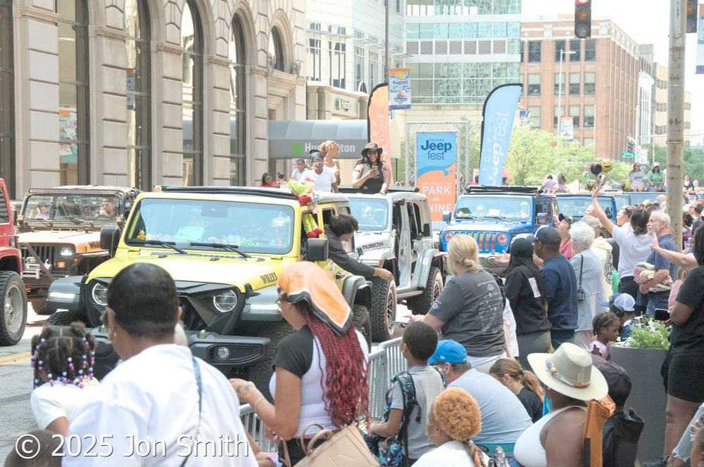 Toledo Jeep Fest 2025 All Jeep Parade passes by onlookers on Huron Street, Downtown Toledo, OH August 2, 2025