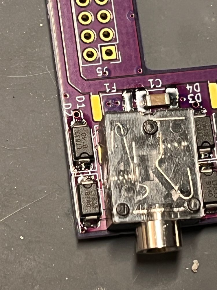 PCB showing the mounted TRS audio jack with a  slight 2 degree turn. It turns out that the KiCAD supplied library footprint has multiple inaccurate dimensions.