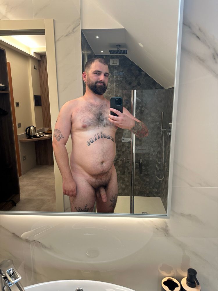 Bathroom mirror selfie of me in my Milan hotel room. I’m naked and have a semi.