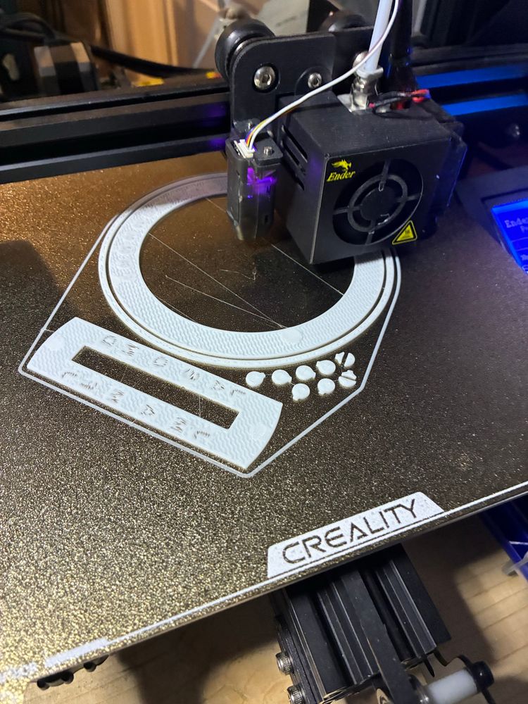 Printing the prototype. I’ll try using UV curing epoxy to fill the markings. 