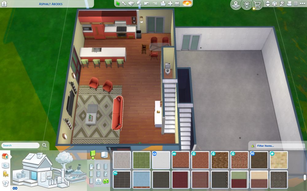 Two townhomes. This photo shows the first floor of one home. It’s open concept with a half bath behind the stairs on the right. The kitchen is small but features a peninsula. A sliding glass door leads out to the backyard. The living room is closer to the front of the home. A wall mounted tv sits over a large area rug, a two-layer coffee table, and in front of a large couch.