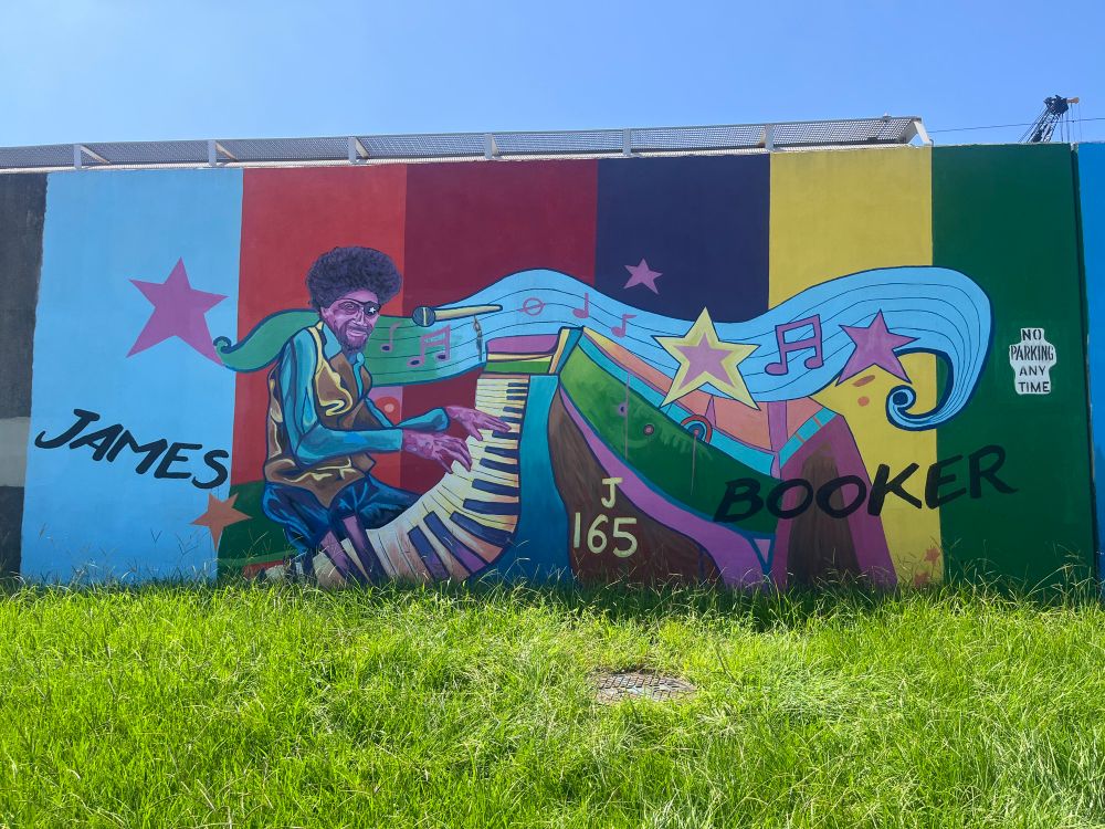 A large colorful mural of James Booker