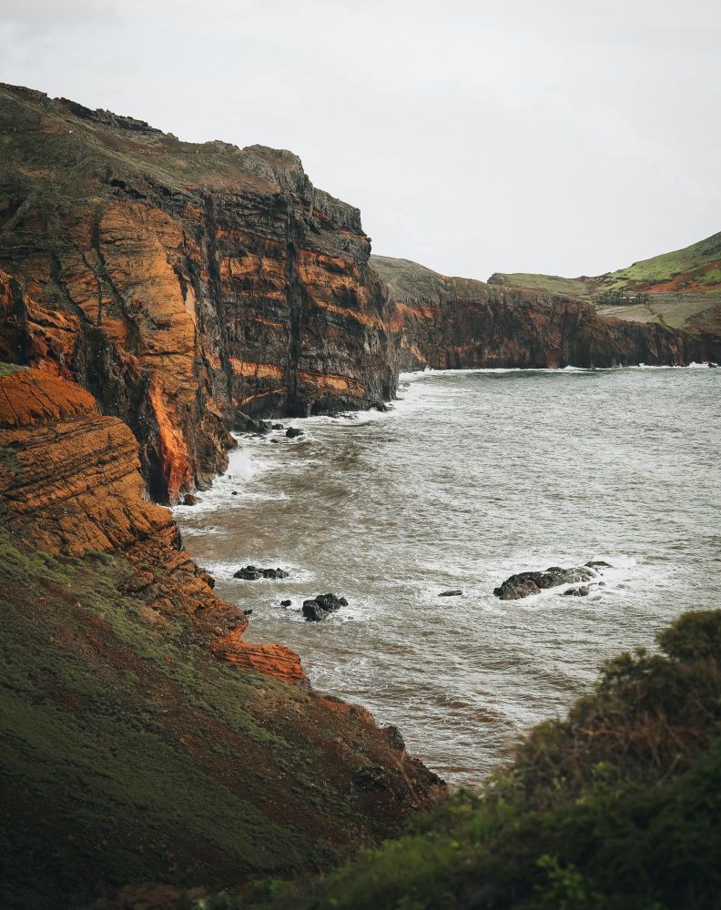 A body of water surrounded by rocky cliffs.