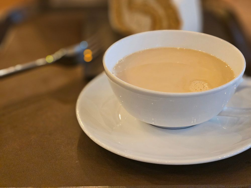 Image of roll cake and Chai