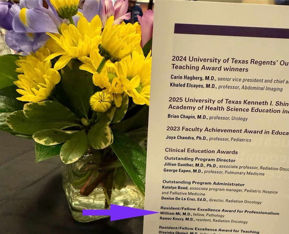 List of awardees and a flower 
