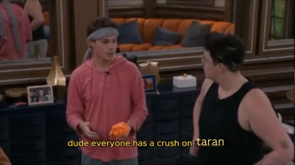 cory talking to izzy. the caption says “dude everyone has a crush on taran”. bb25