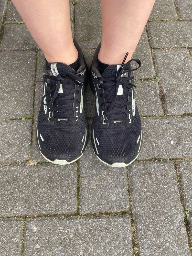 Rebecca’s feet in a pair of running shoes