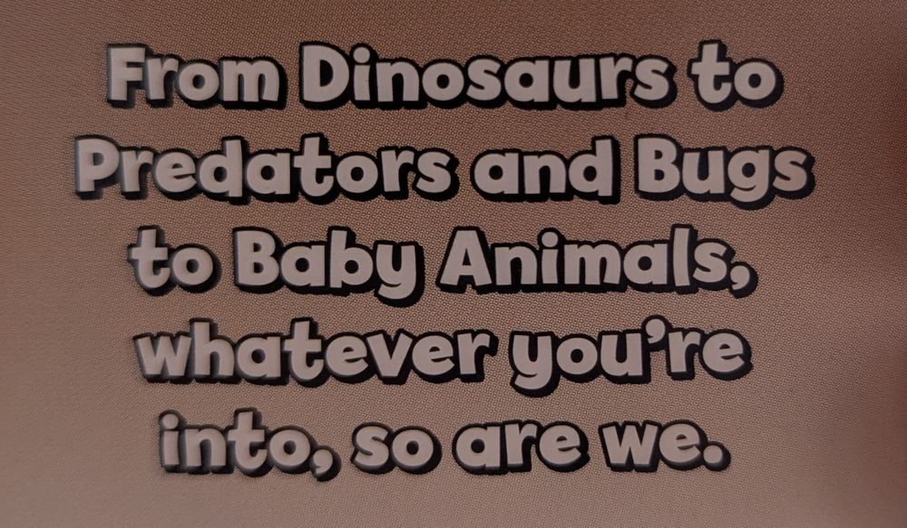 Part of a Top Trumps card that says 'From Dinosaurs to Predators and Bugs to Baby Animals, whatever you're into, so are we.'