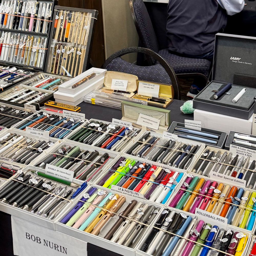 Table by Bob Nurin featuring a massive Lamy collection. 
