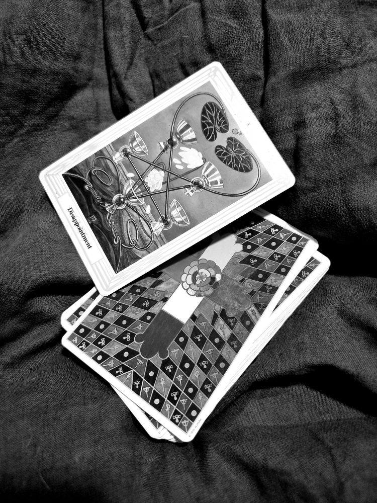 Thoth tarot deck with 5 of cups