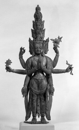 The "Eleven-Headed Avalokiteshvara" is a striking sculpture representing the bodhisattva of compassion, Avalokiteshvara, renowned for having eleven heads and multiple arms to symbolize his all-encompassing ability to perceive the suffering of all beings. Reflecting the intricate craftsmanship of Asian religious art, this statue is part of the Brooklyn Museum's collection and epitomizes the devotion and complex iconography typically associated with Buddhist figures.
