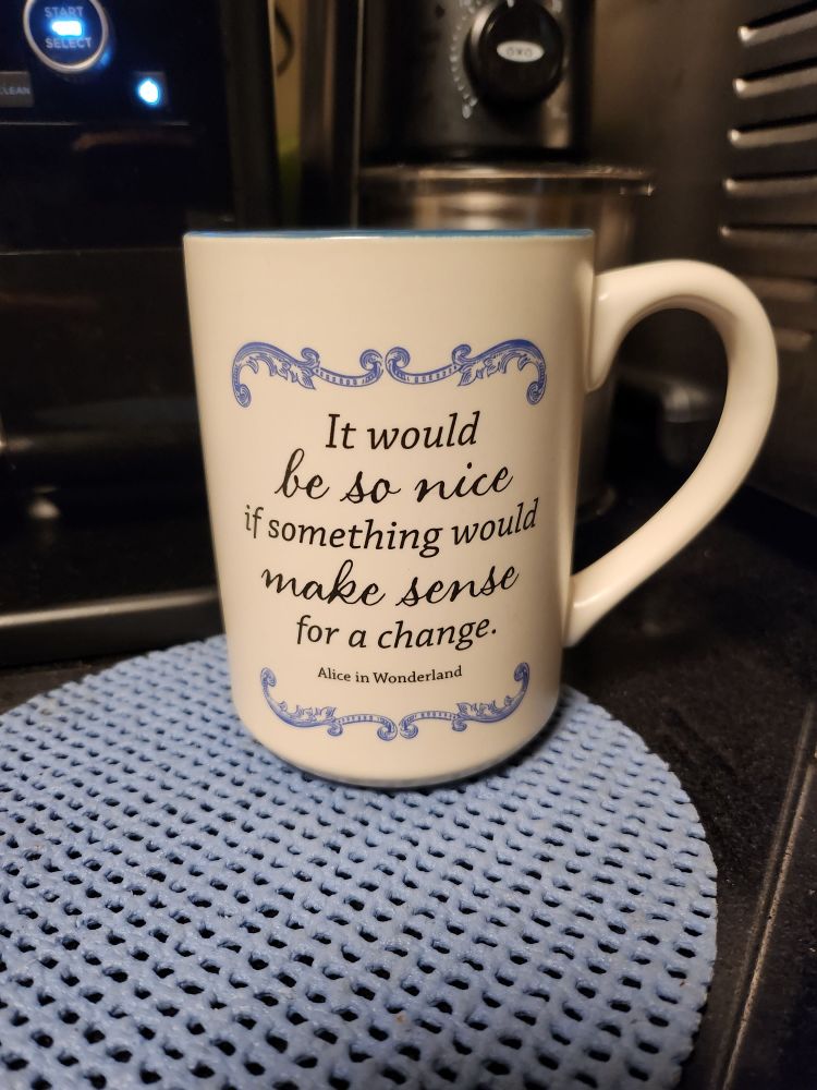 Coffee mug with the quote, "It would be so nice if something would make sense for a change" Alice In Wonderland 