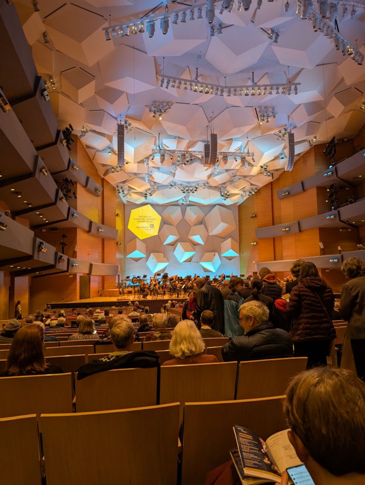 Audience view of orchestra hall in Minneapolis with the MN orchestra on stage