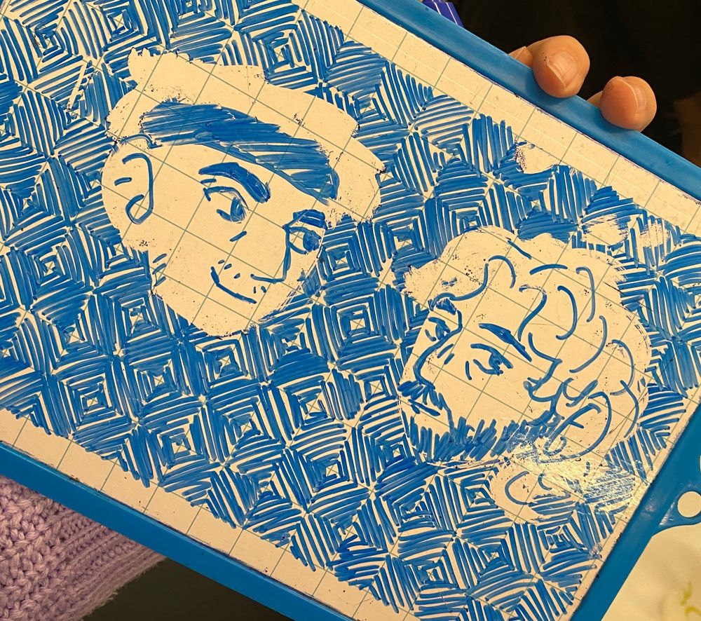 guapoduo on a small white board