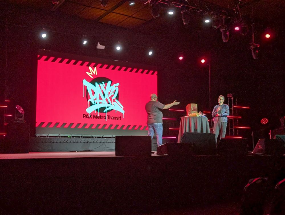 Jerry Holkins and Kris Straub being funny on stage. 