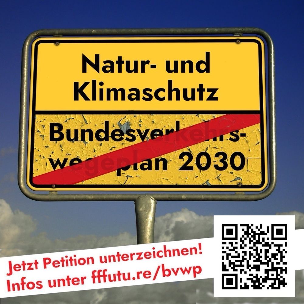 Ortschild mit einem druchgestrichenen Bundesverkehrswegeplan 2030 und dem nächsten Ort Natur- und Klimaschutz. 