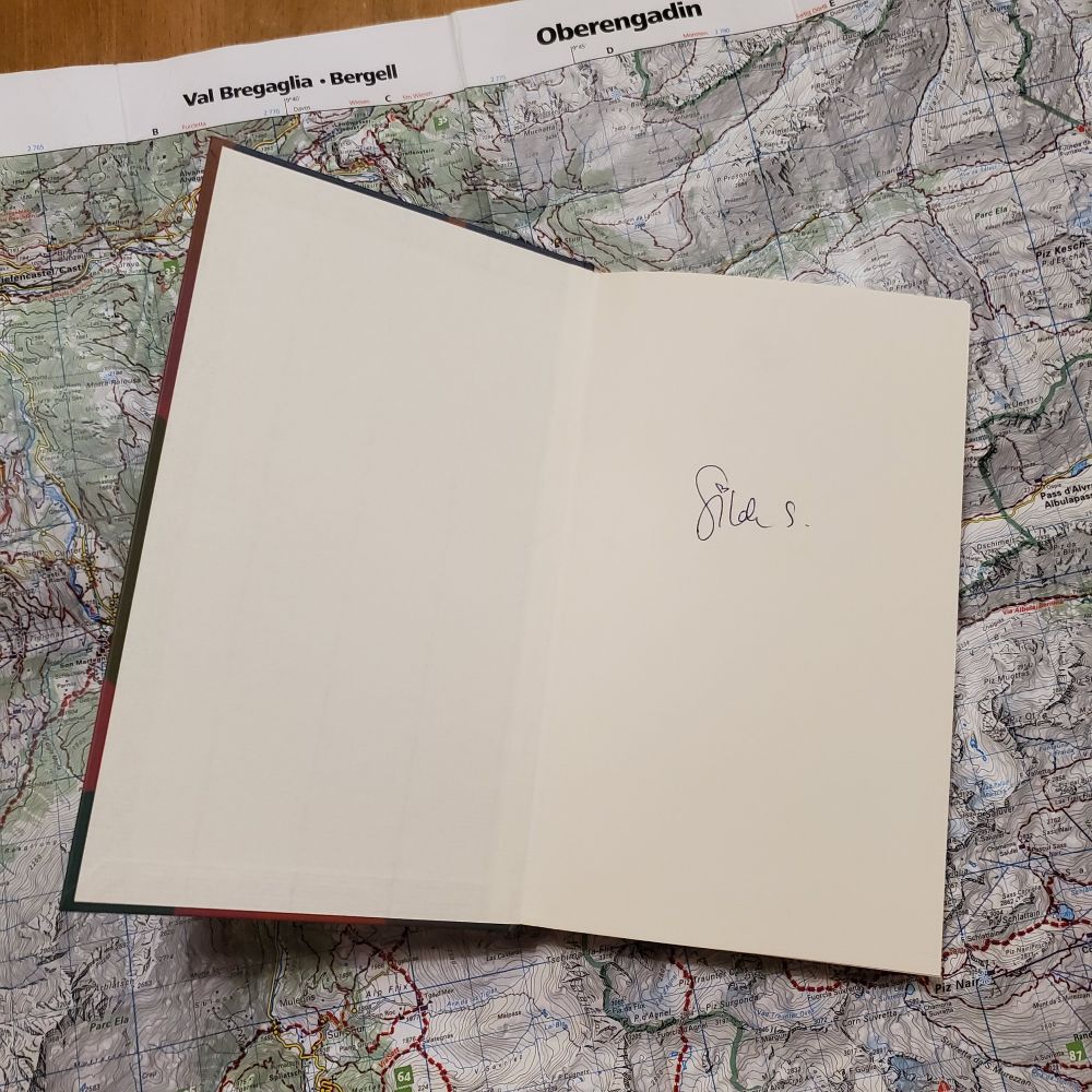 Das Foto zeigt die Signatur von Gilda Sahebi in ihrem Buch "Verbinden statt spalten" 