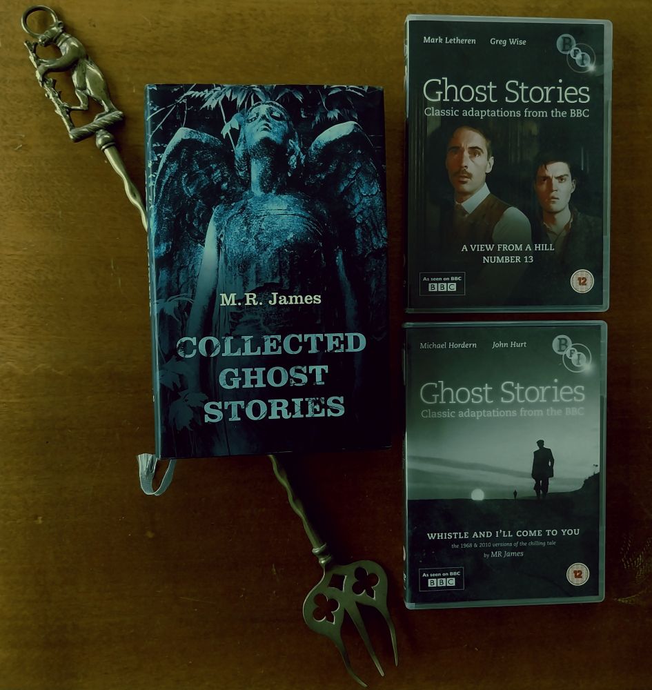 Front cover of Collected Ghost Stories by M. R. James resting on a antique brass toasting fork. Alongside are the covers of CDs of BBC adaptations of A View From A Hill and Whistle And I'll Come To You illustrated with stills from the programmes 