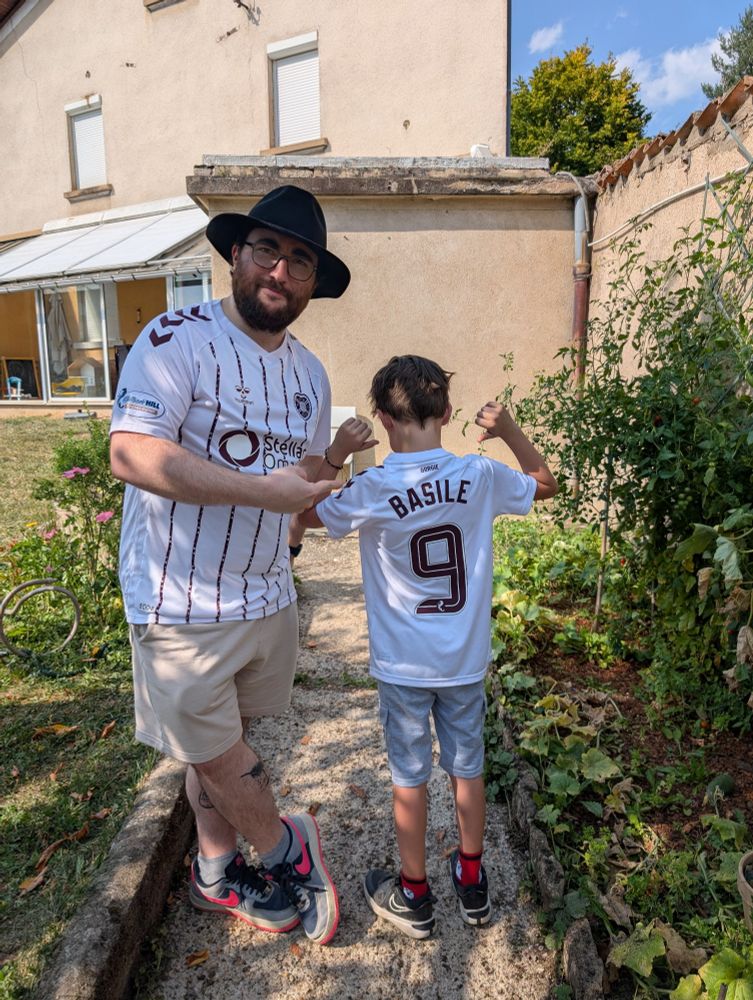Picture of HMFC_France with his nephew and his new Hearts shirt with his first name on the back with the number 9