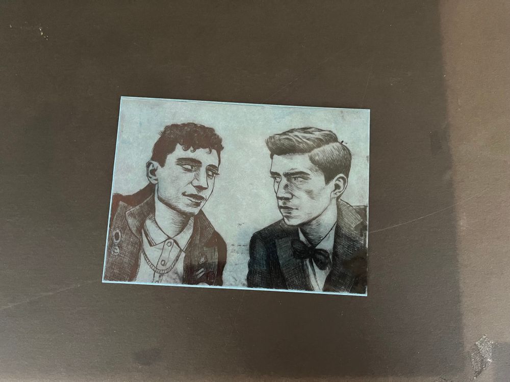 Close-up photo of the cyanotype paper and the plate. The blue colour has almost turned white now.
