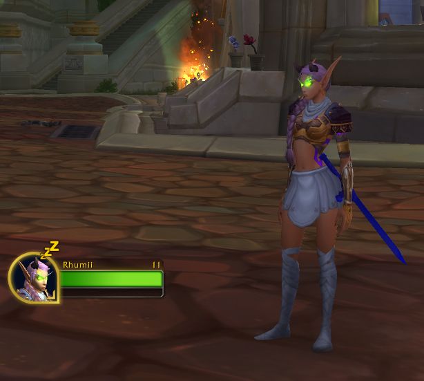 A screenshot from world of Warcraft of a player character named Rhumii who is a demon hunter in an outfit reminiscent of kpop demon hunters.