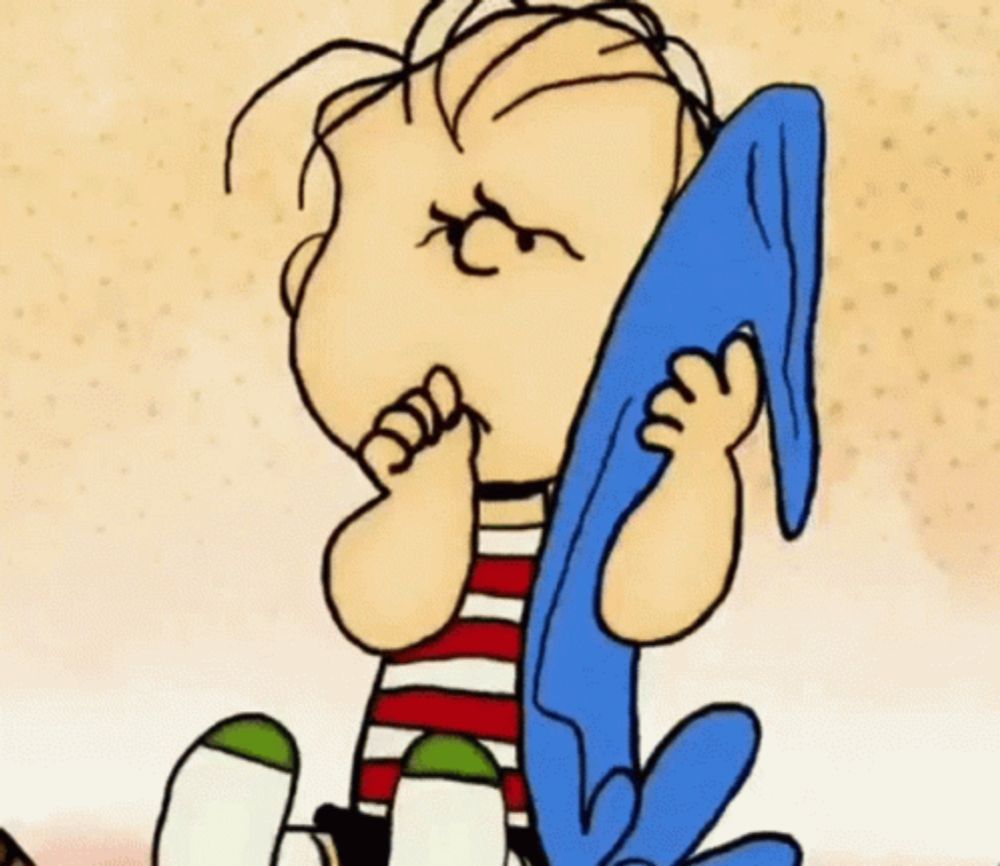 a close up of a cartoon character holding a blue towel in his hands .