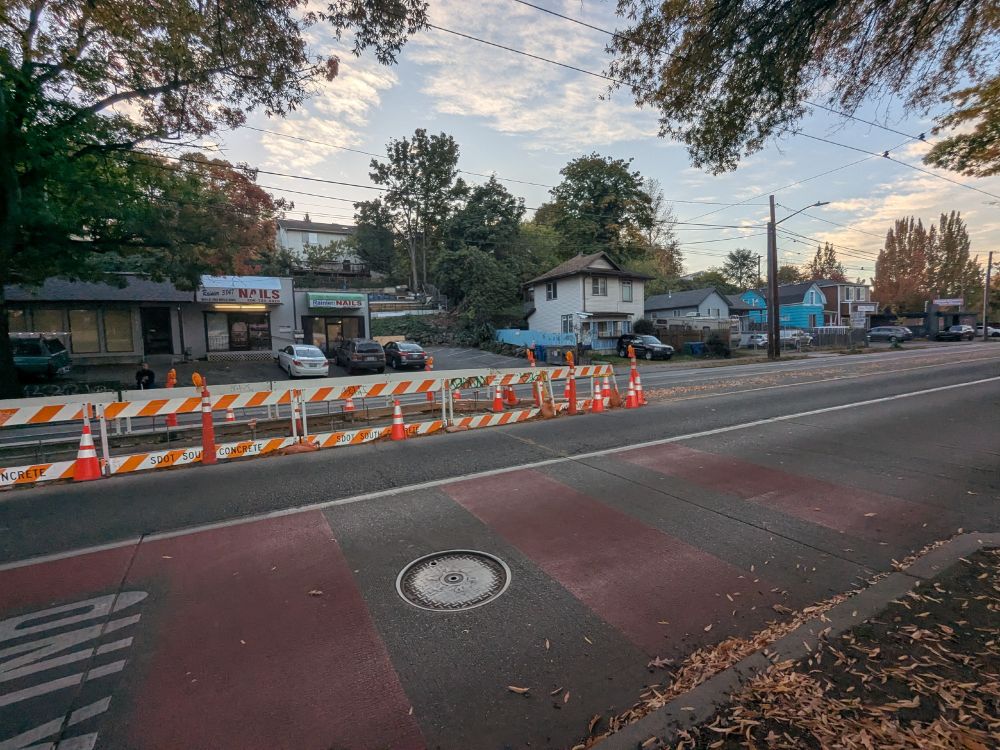 high vis barriers in the center turn lane of Rainier