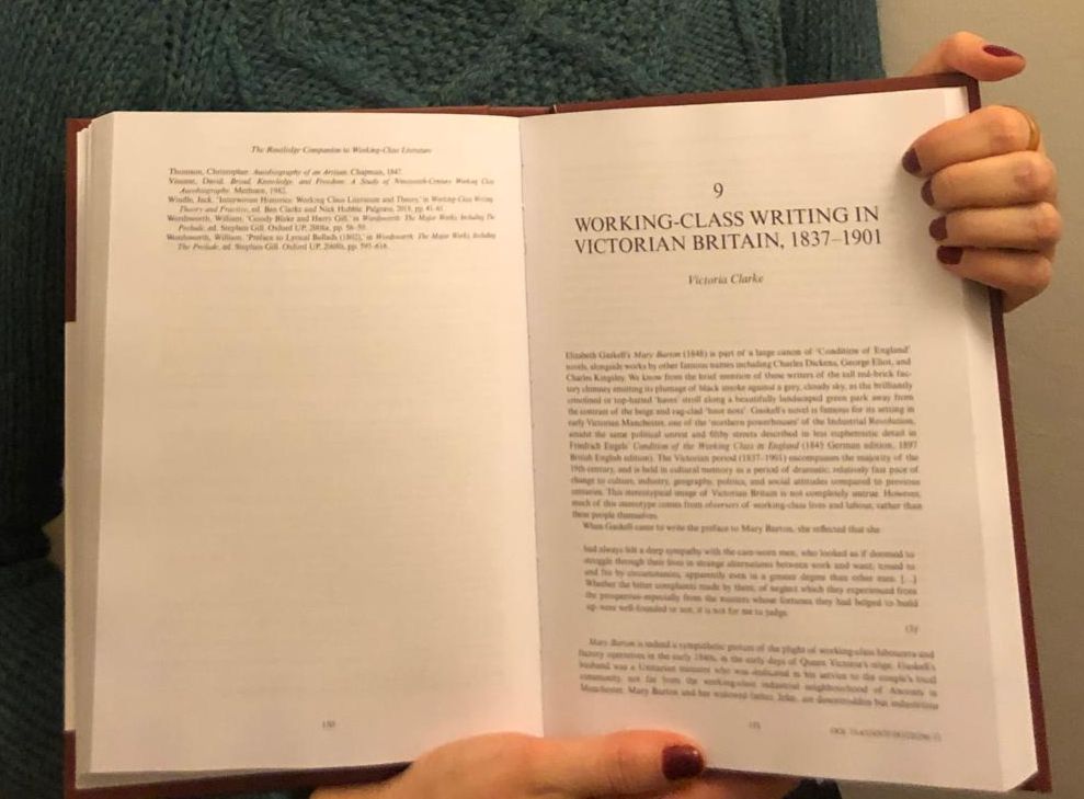 Vic holds open the first page of her chapter, 'Working-Class Writing in Victorian Britain'