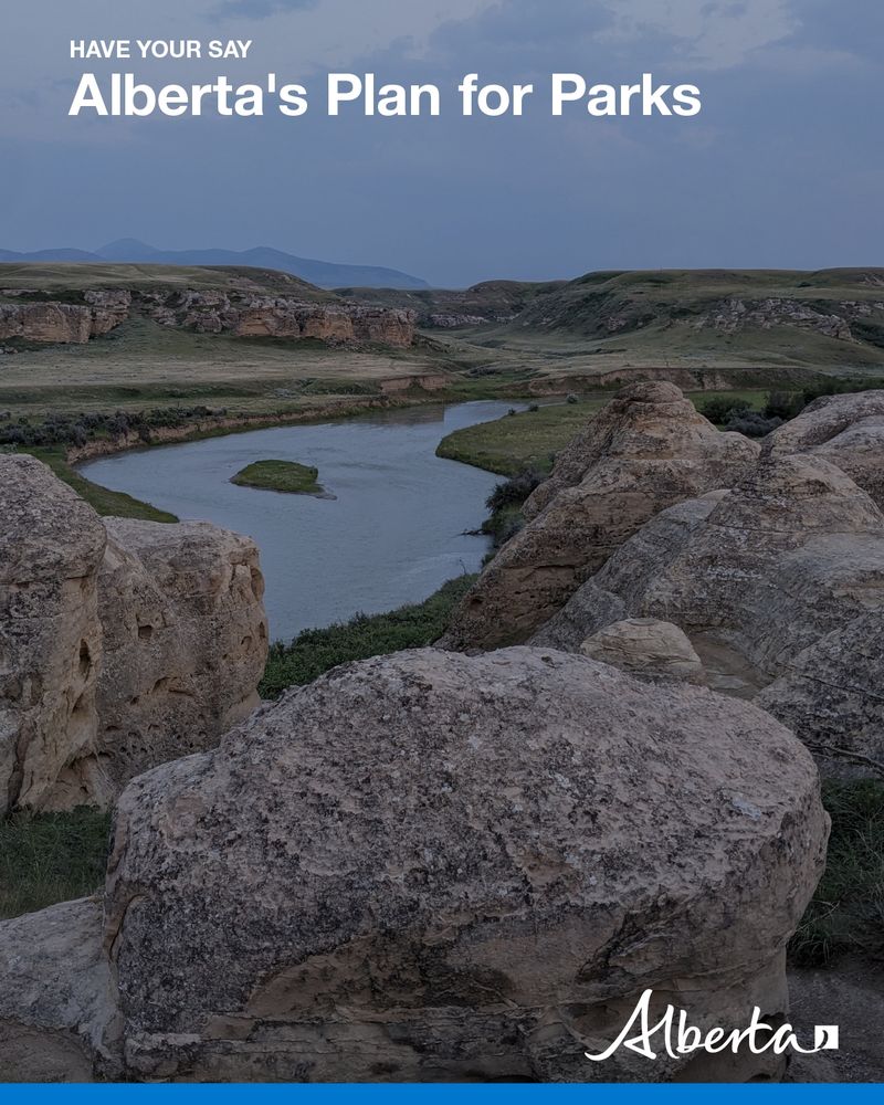 Text reads: Have your say. Alberta’s Plan for parks. Writing on Stone hoodoos. The white Alberta logo is on the bottom right.