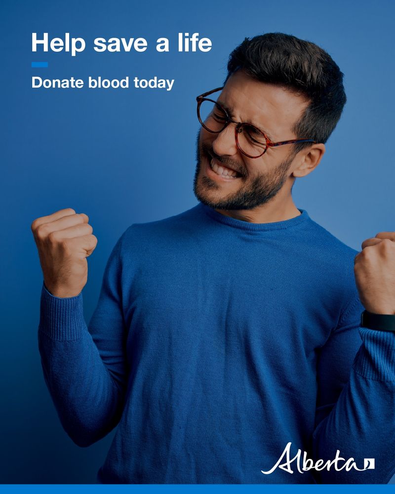 A person smiling and pumping their fists. Text reads Help save a life: donate blood today. The Alberta government logo is in the bottom right corner. 
