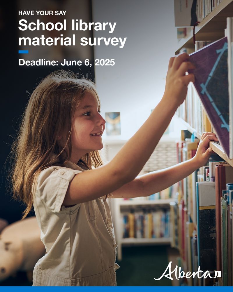 A smiling school-grade girl is pulling a book from a shelf in her school library. The text reads Have Your Say, School library material survey. Deadline June 6, 2025. The white Alberta logo is in the bottom right hand corner. 