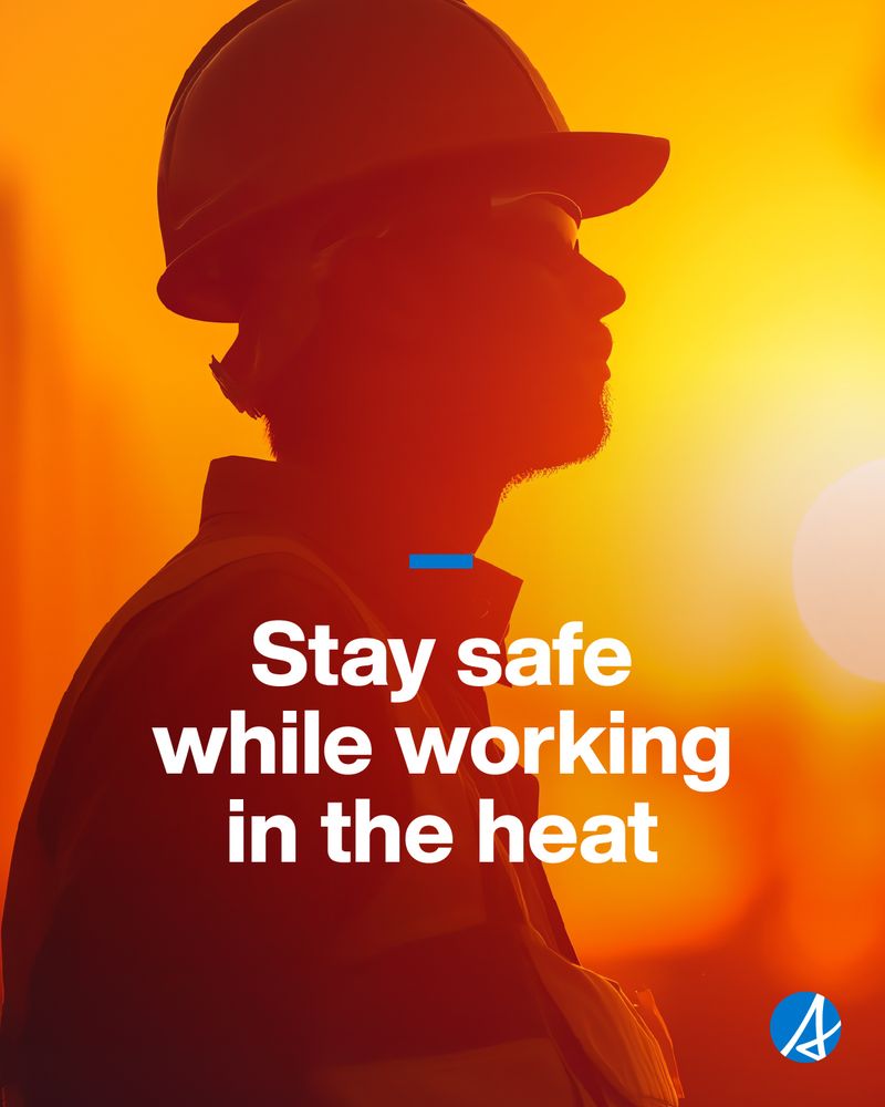 A person wearing a hard hat the background shows an orange haze. Text reads Stay safe while working in the heat. The Alberta government logo is in the bottom right corner. 