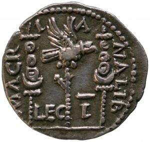 Roman coin showing a legionary eagle between two military standards