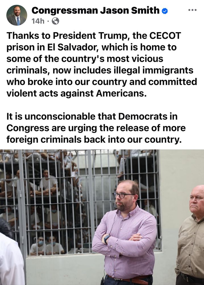 A picture of Missouri congressman, Jason Smith standing in front of prisoners in El Salvador.