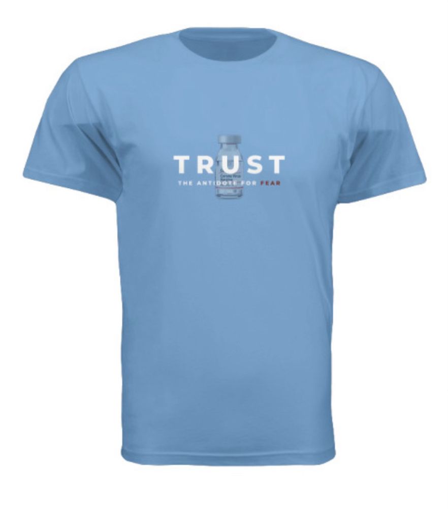 A blue t-shirt with a bottle of COVID vaccine on the chest. The following words are printed over the bottle: