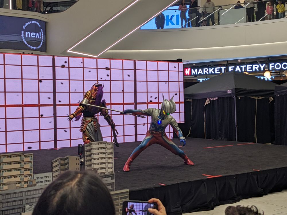Ultraman Zero delivers a chanbara style killing blow to Nodachi Zamsher as part of the Ultraman Live show at American Dream Mall.