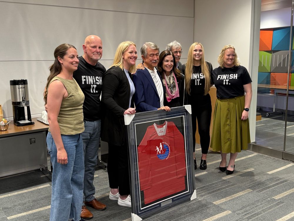 Members of the Fox family and departing Directors of TFRI (L to R: Jessie, Fred, Kirsten, Vic, Marla, Chris, Alexandra and Erin).