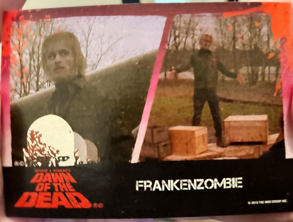 A Dawn Of The Dead (1978) trading card featuring that one zombie who gets the top of his head lopped off by a helicopter rotor.