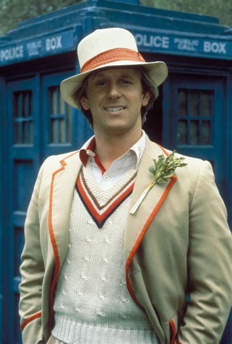 Peter Davison as doctor who, wearing a sort of cricket outfit with a cream blazer and silly hat with a stick of celery pinned to his lapel.