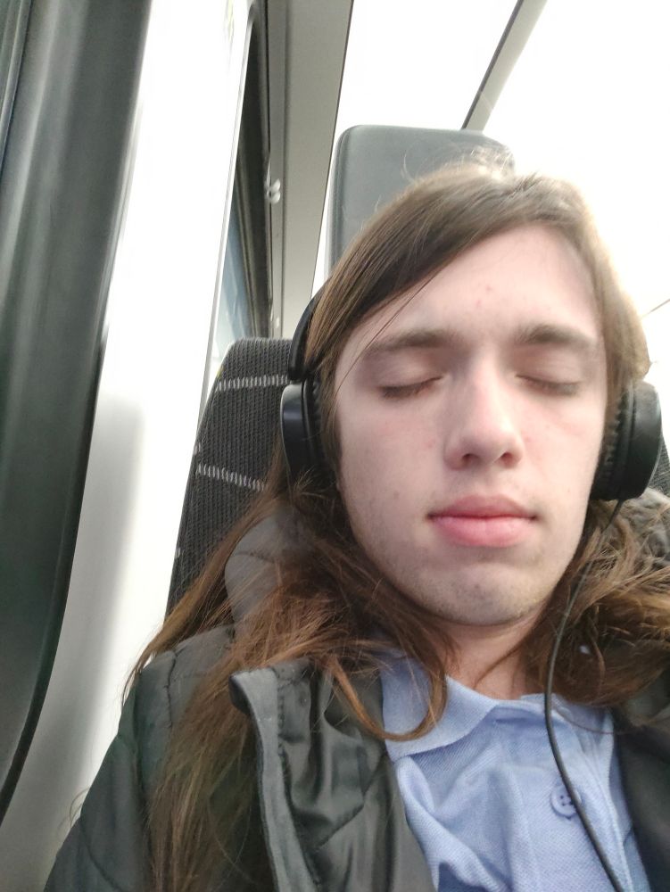 Me looking asleep on the train but it's actually acting wow.