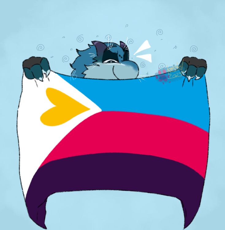 Marcel looking down as he holds the polyamorous flag with a smile 