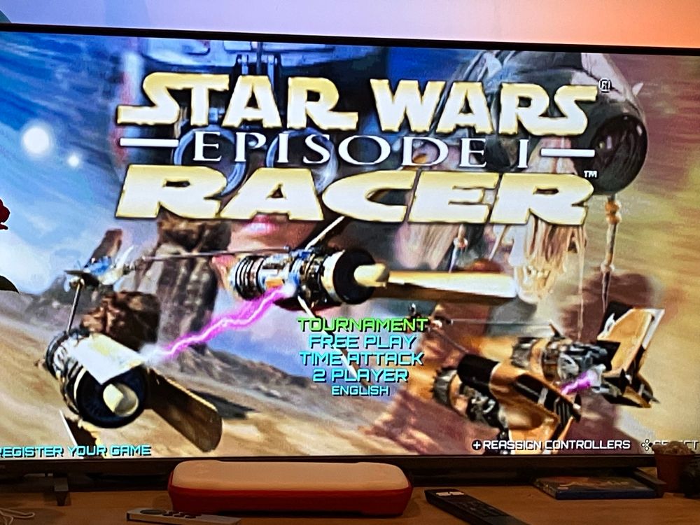 Photo of a TV showing the main menu of Star Wars Episode 1 Pod Racer for the Switch playing on the Switch 2