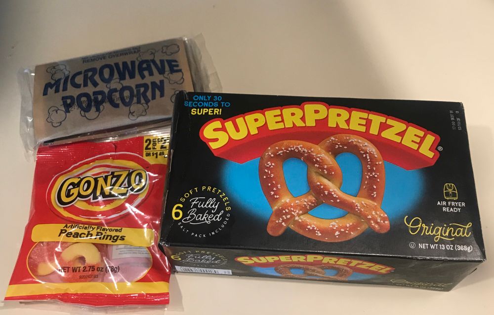 Microwave popcorn, gonzo peach slices, and super pretzels 