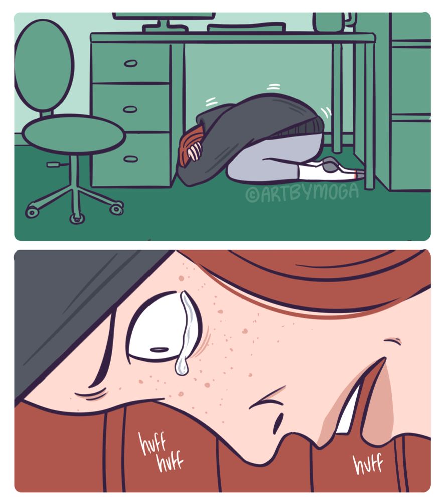 Meg curled up under her desk, having a panic attack 