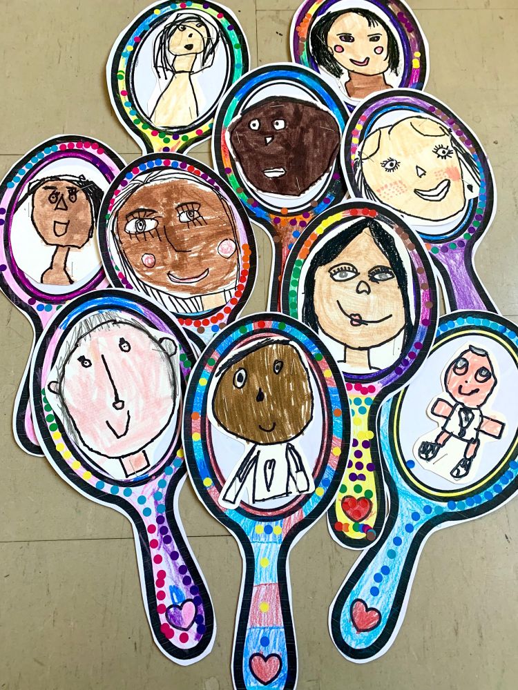Student drawn self-portraits inside colourful mirror templates