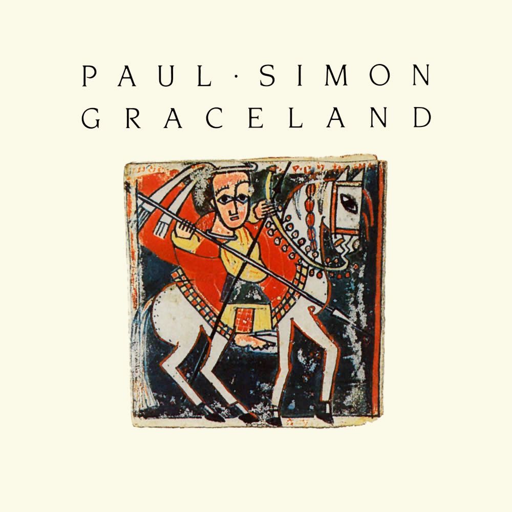The cover art for Paul Simon's "Graceland" album: on a cream-colored background, the words "PAUL SIMON" and "GRACELAND" above a primitive cubist artwork St. George riding a white horse, taken from a 15th century Ethiopian manuscript.